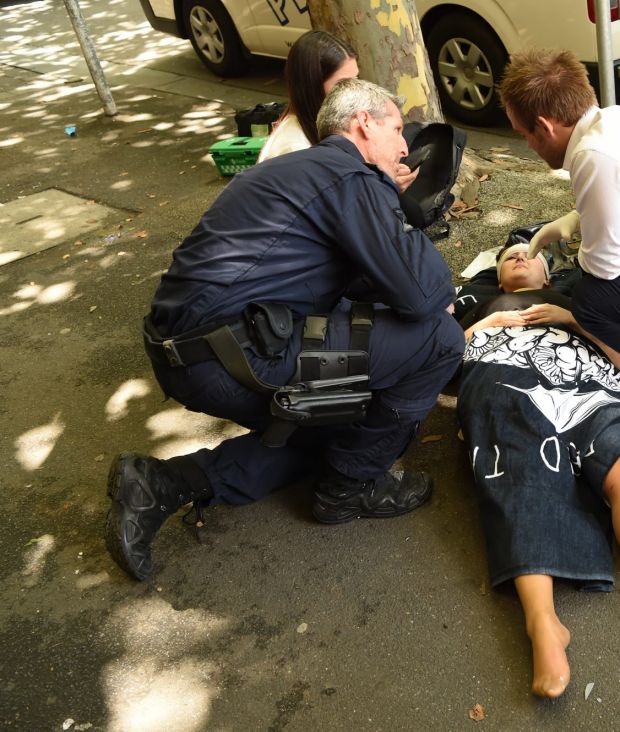 An injured person gets help.