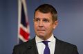 Premier Mike Baird struggled to contain his emotions at a press conference announcing his resignation.