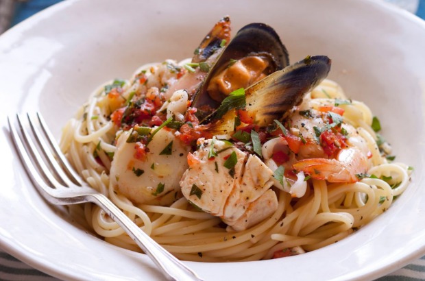 Pasta marinara packed full of summer seafood <a ...