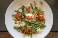 Stracciatella, grilled asparagus, romesco sauce, almonds and saba served at Union Dining in Richmond.