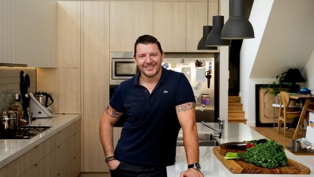 Manu Feildel inside his home kitchen.