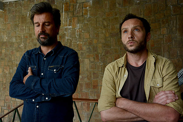 Jean-Philippe Remy and Philip Edward Moore are pictured soon after their release from police custody in Bujumbura, Burundi, January 29, 2016 (AFP)