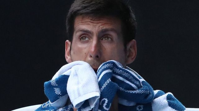 Novak Djokovic reacts after losing to Denis Istomin.