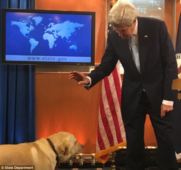 Secretary of State John Kerry surprised the State Department on Thursday by bringing along his dog Ben to his final briefing