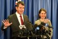 NSW Premier Mike Baird and Treasurer Gladys Berejiklian want to privatise the land titles registry. 