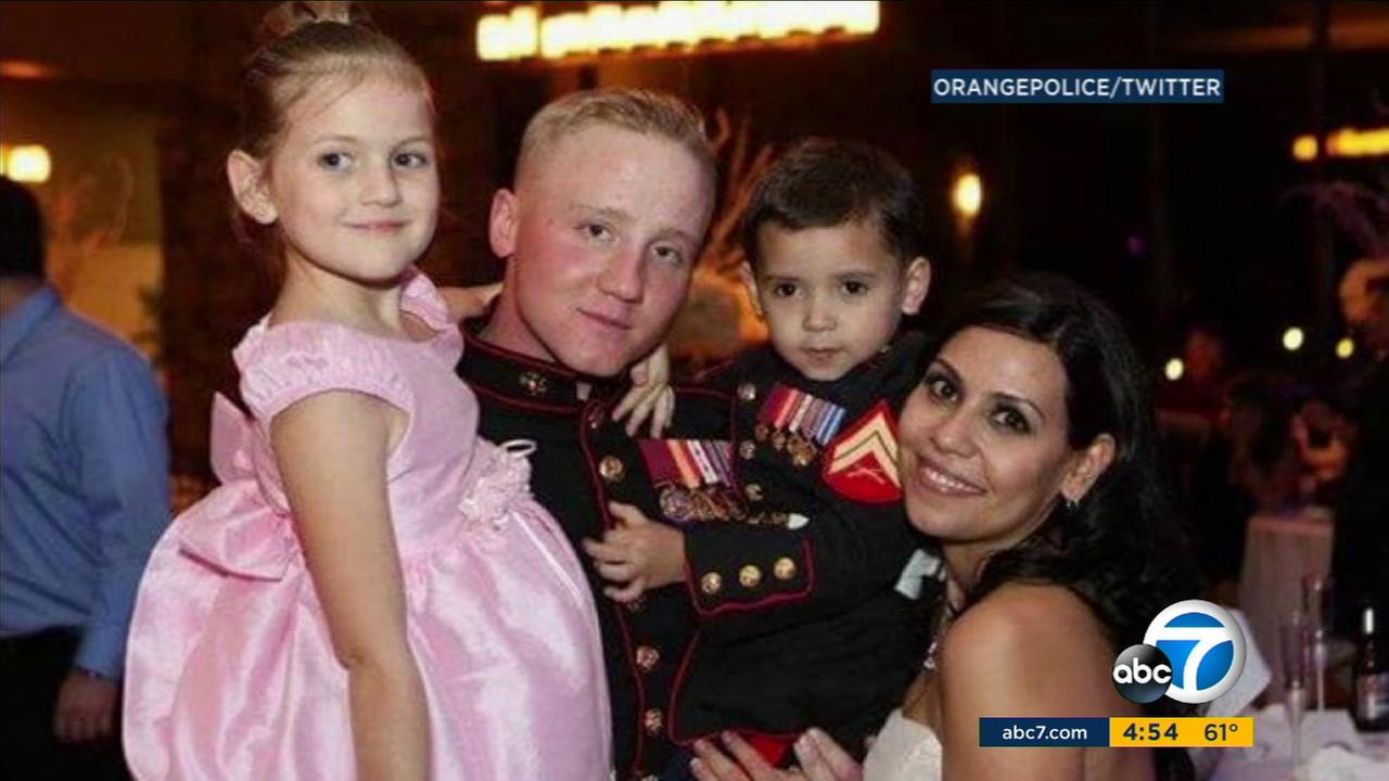 Orange Police Department Officer Sharif Muzayen, a Marine Corps veteran, is seen in an undated photo with his family.