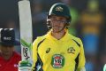 Peter Handscomb celebrates his half-century on ODI debut.