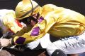 Deanne Panya riding on Testashadow, left, beats Tye Angland on Perfect Dare in Magic Millions Cup on the Gold Coast.