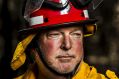 Bungendore RFS Captain, Sheldon Williams, in burnt land near Hazeldell Rd where he worked to save properties in January ...