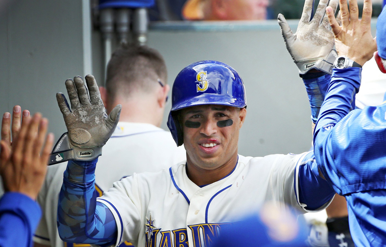 Mariners center fielder Leonys Martin celebrates another run against the Brewers, Sunday, Aug. 21, 2016, at Safeco Field in Seattle. (Ken Lambert / The Seattle Times)