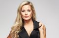 Madeleine West (who plays Dee Bliss) in Neighbours. Her character is coming back from the grave after a 13-year hiatus.