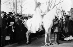 In this photo provided by the Library of Congress, taken in 1913, attorney Inez Milholland Boissevain rides astride suffrage parade in Washington as the first of four mounted heralds. (Library of Congress via AP)