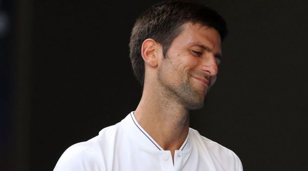 Novak Djokovic of Serbia reacts in his second round match against Denis Istomin of Uzbekistan.