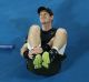 Andy Murray holds his ankle.