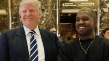 President-elect Donald Trump and Kanye West pose for a picture in the lobby of Trump Tower.