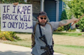 A heavily armed protestor outside Brock Turner's house