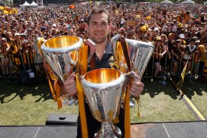  Luke Hodge with the 2013, 2014 and 2015 premiership trophies.