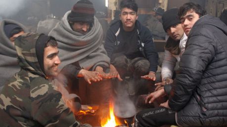 Some refugees have no warm clothes, as the freeze settles in south-east Europe. 