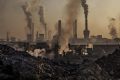 Smoke billows from a large steel plant in Inner Mongolia, China.