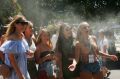 MELBOURNE, AUSTRALIA - JANUARY 16: Girls cool off under misting fans during day 1 of the Australian Open on January 16, ...