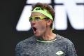 Colourful: Denis Istomin is hard to miss with his eye-catching glasses and bandana.