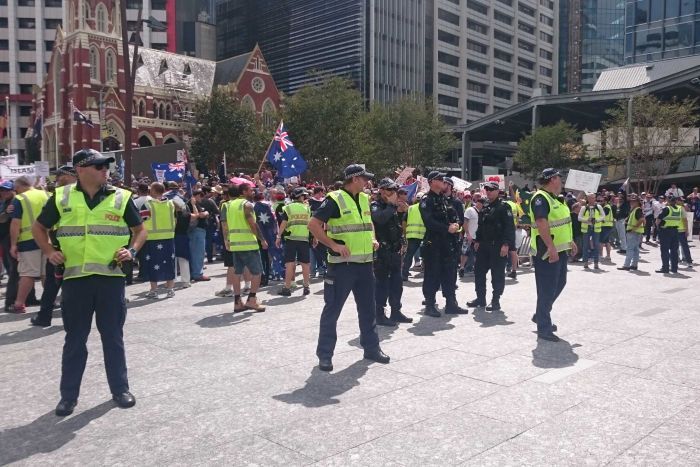 Police at Brisbane's Reclaim Australia rally, which was met by opposing groups