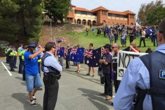 Police separate protesters from opposing groups in Perth
