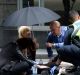 A person receives treatment in the aftermath of the Bourke Street incident