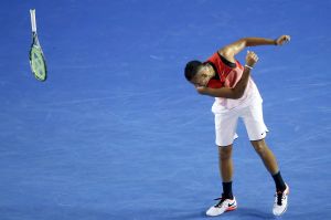 Kyrgios clause: Nick smashes his racquet at the Australian Open last year.