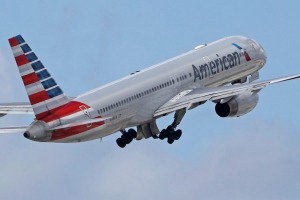 In this Friday, June 3, 2016, photo, an American Airlines passenger jet takes off from Miami International Airport in ...