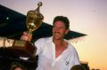 Winners: Australia captaijn Allan Border holds the 1987 World Cup trophy aloft in Kolkata.
