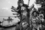 Devotees drown a statue of Durga, the Bengali avatar of goddess Kali, in the Hoogly river.