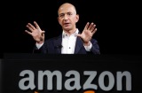 FILE - In this Sept. 6, 2012, file photo, Jeff Bezos, CEO and founder of Amazon, speaks at the introduction of the new ...
