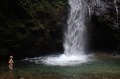 We walk to spectacular waterfalls and then dive in to cool off.