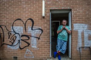 Tenders for the demolition of the Red Hill flats have been called for. Current resident Troy Osborn. Photo by Karleen Minney.