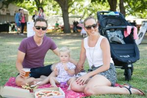 Kris, Audrey 12m and Megan Johnston of Bruce at the the Commons Street Feast is a street food and food truck festival, ...