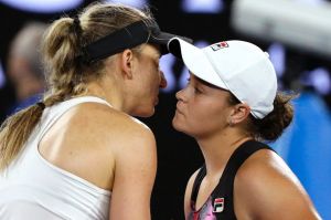 Germany's Mona Barthel, left, is congratulated by Australia's Ash Barty.