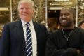 President-elect Donald Trump and Kanye West pose for a picture in the lobby of Trump Tower.