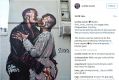 Scott Marsh was reportedly paid by Kanye West's management to paint over his mural of the singer embraces himself.