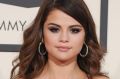 A smoky almond pigmented eye is the go-to for Selena Gomez.