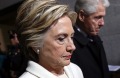 Hillary Clinton and former Presidential Bill Clinton arrive on the West Front of the Capitol in Washington.