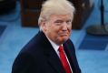 U.S. President-elect Donald Trump, left, stands on stage with U.S. Vice President Mike Pence during the 58th ...