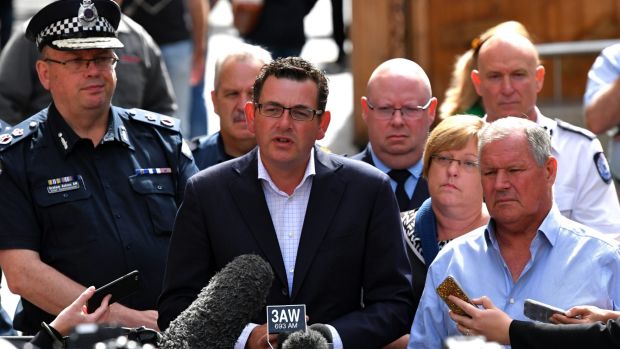 Chief Commissioner Graham Ashton, Premier Daniel Andrews, and lord mayor Robert Doyle address the media. 