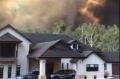 Fire crews were battling the blaze threatening homes at Coolum.