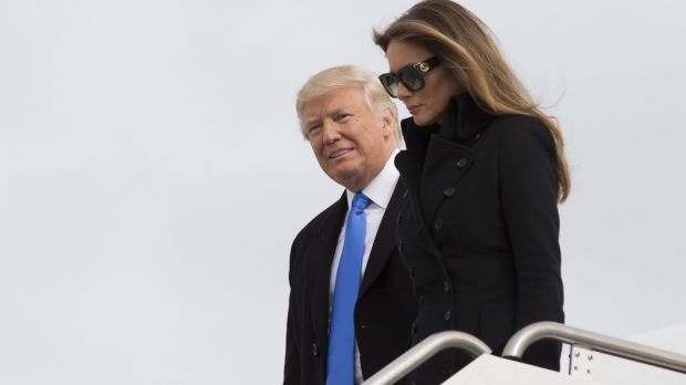 US President-elect Donald Trump and wife Melania arrive in Washington, the day before the inauguration.