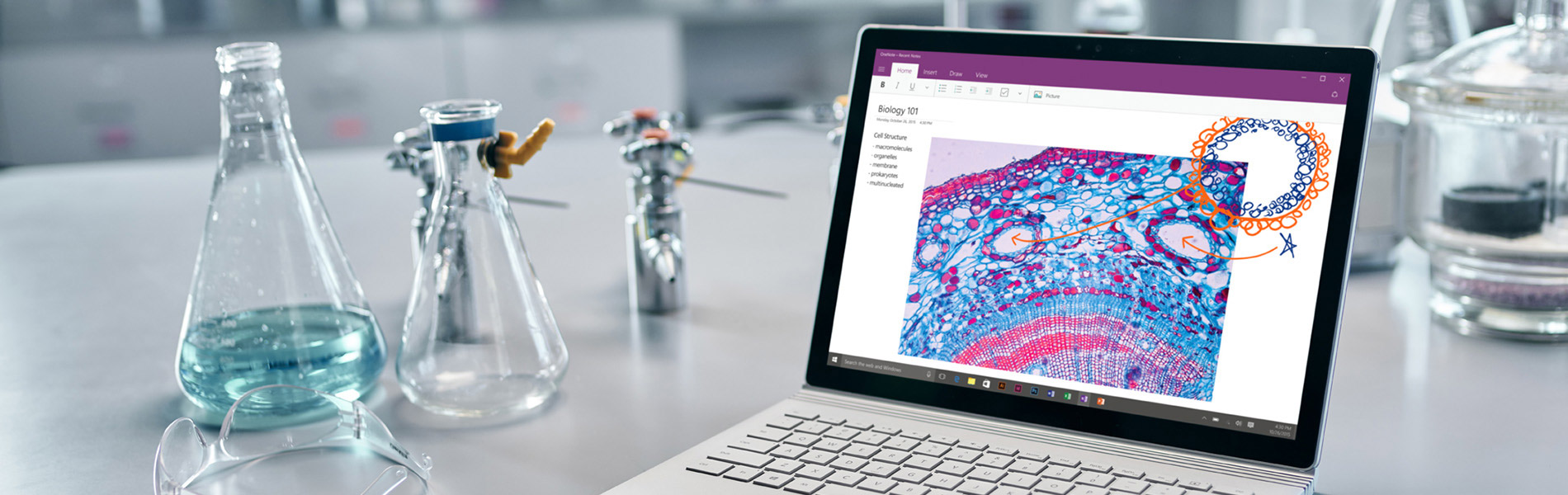 An image of a laptop using onenote in a science laboratory