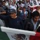 Protesters march during a demonstration against the rising prices of gasoline enforced by the Mexican government in downtown Mexico City, Mexico, Jan. 7, 2017.