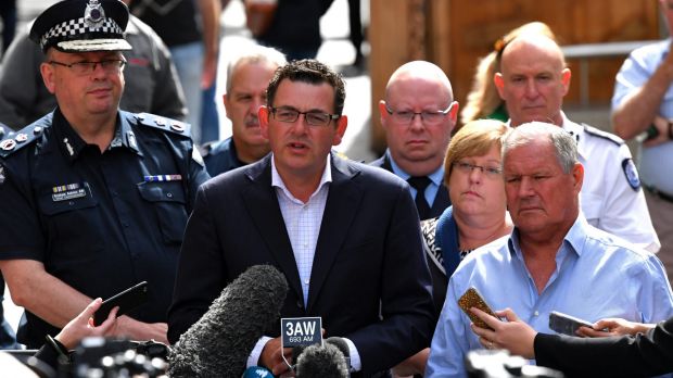 Chief Commissioner Graham Ashton, Premier Daniel Andrews, and lord mayor Robert Doyle address the media.