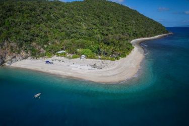 The couple that owns the only home on a secluded island in the Great Barrier Reef