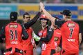 Renegades celebrate the wicket of Jack Wildermuth.